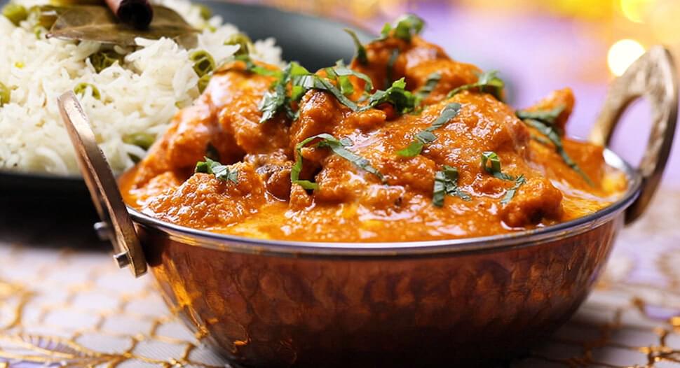 Butter chicken masala served with Pilaf